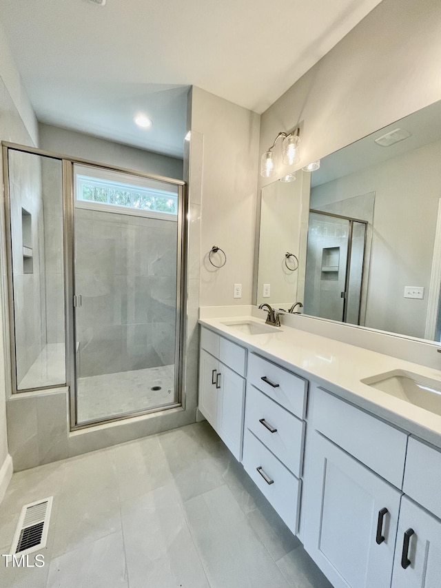 6786 Fire Tower Rd, Bailey, NC 27807 - full bathroom featuring double vanity and a stall shower