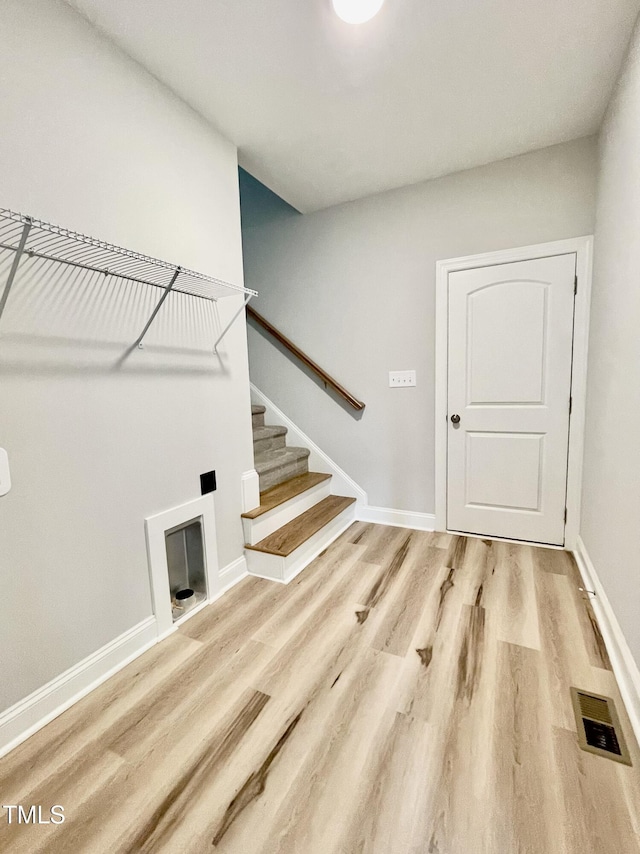6786 Fire Tower Rd, Bailey, NC 27807 - washroom with wood finished floors and baseboards