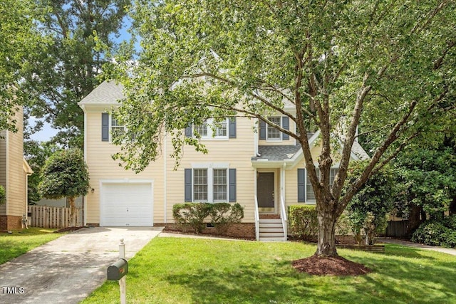205 Mint Hill Dr, Cary, NC 27519 - view of front of home featuring concrete driveway, a garage, and roof with shingles
