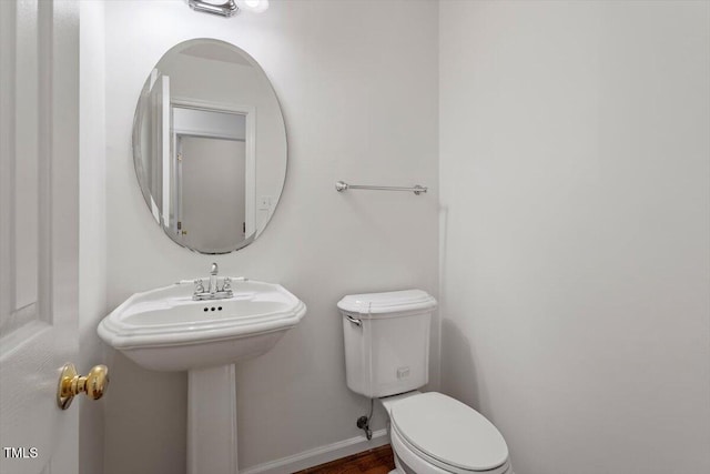 205 Mint Hill Dr, Cary, NC 27519 - half bathroom with toilet and a sink
