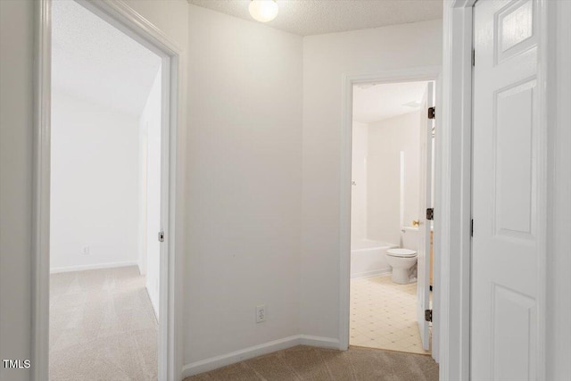 205 Mint Hill Dr, Cary, NC 27519 - hallway with light colored carpet and baseboards