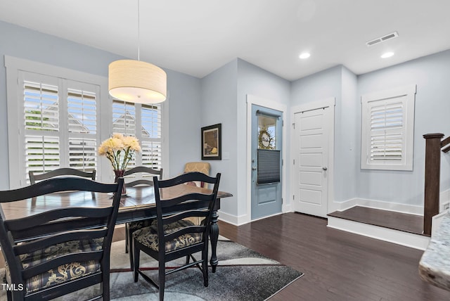 1448 Big Falls Dr, Wendell, NC 27591 - dining area featuring baseboards, dark wood finished floors, and recessed lighting