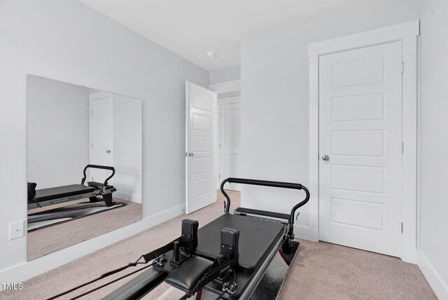 1448 Big Falls Dr, Wendell, NC 27591 - exercise room featuring carpet floors and baseboards