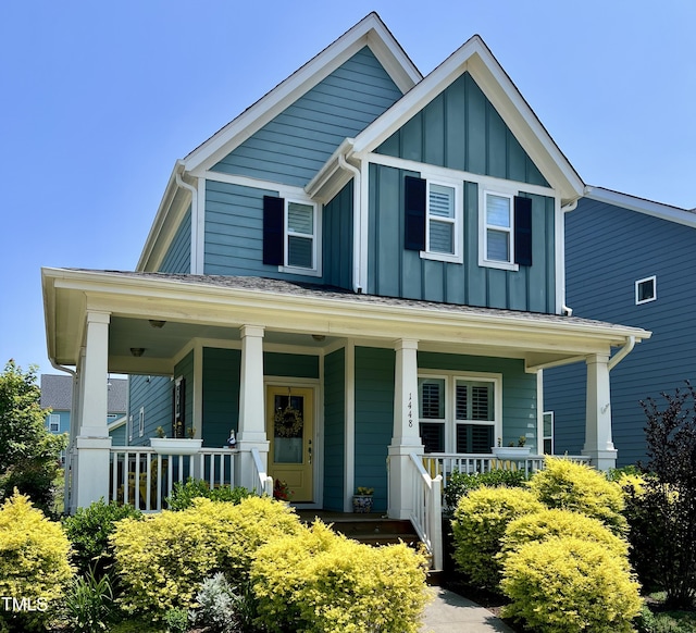 1448 Big Falls Dr, Wendell, NC 27591 - view of front of property featuring board and batten siding and covered porch