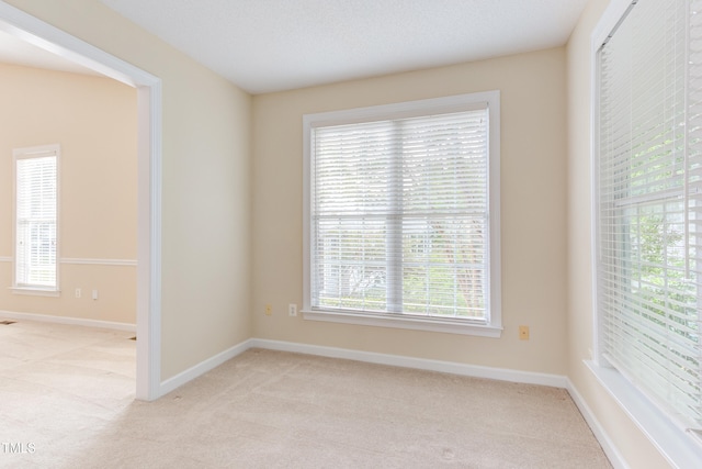 2026 Heritage Pines Dr, Cary, NC 27519 - unfurnished room featuring light colored carpet and baseboards