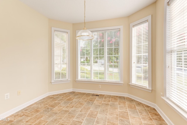 2026 Heritage Pines Dr, Cary, NC 27519 - unfurnished dining area with baseboards