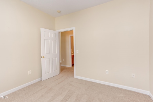 2026 Heritage Pines Dr, Cary, NC 27519 - unfurnished room featuring light carpet and baseboards