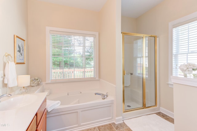 2026 Heritage Pines Dr, Cary, NC 27519 - bathroom with vanity, a shower stall, a bath, and tile patterned flooring
