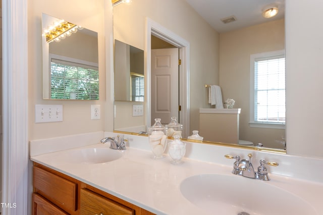2026 Heritage Pines Dr, Cary, NC 27519 - bathroom with healthy amount of natural light and double vanity