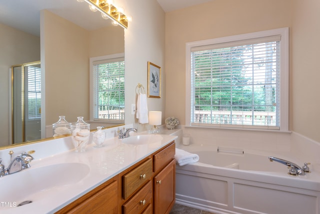 2026 Heritage Pines Dr, Cary, NC 27519 - full bathroom with plenty of natural light, a garden tub, and double vanity