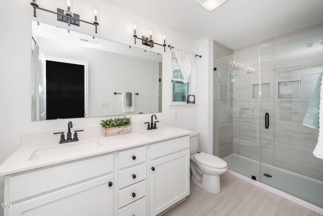 109 Periwinkle Pl, Clayton, NC 27527 - full bath with double vanity, a stall shower, and toilet