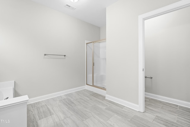 44 Good Morning Ln, Garner, NC 27529 - full bath featuring a stall shower, baseboards, and vanity