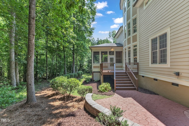 104 Bellagio Dr, Apex, NC 27539 - view of yard with a sunroom, stairs, a deck, and a patio area