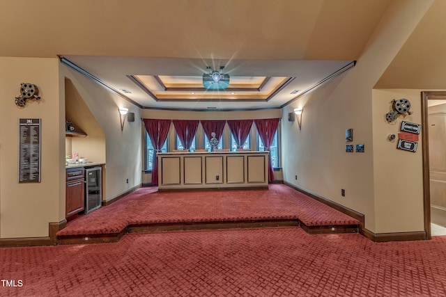 104 Bellagio Dr, Apex, NC 27539 - home theater room with carpet, a raised ceiling, a dry bar, baseboards, and healthy amount of natural light