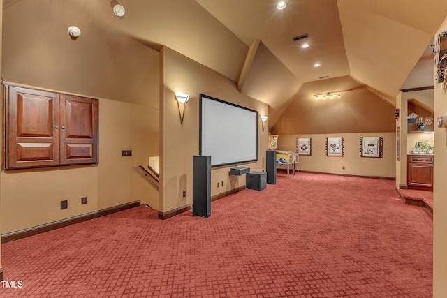 104 Bellagio Dr, Apex, NC 27539 - cinema room featuring light carpet, vaulted ceiling, baseboards, and recessed lighting