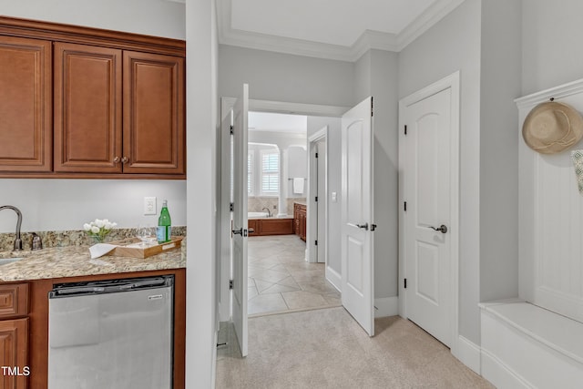 104 Bellagio Dr, Apex, NC 27539 - indoor wet bar with dishwashing machine, crown molding, light colored carpet, and baseboards
