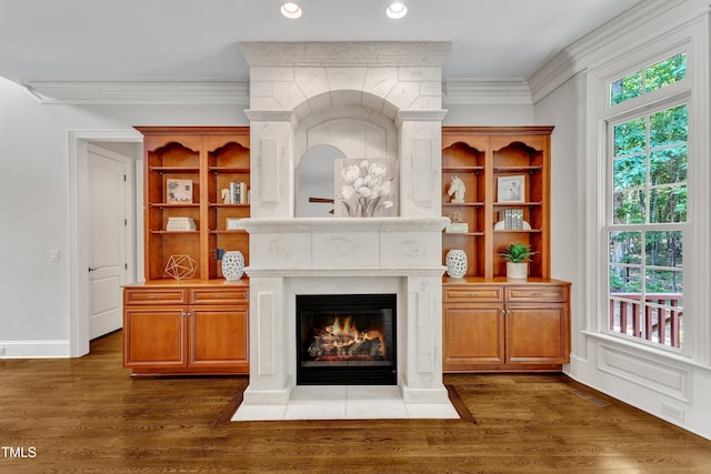 104 Bellagio Dr, Apex, NC 27539 - living area featuring a fireplace, crown molding, dark wood-style flooring, recessed lighting, and baseboards