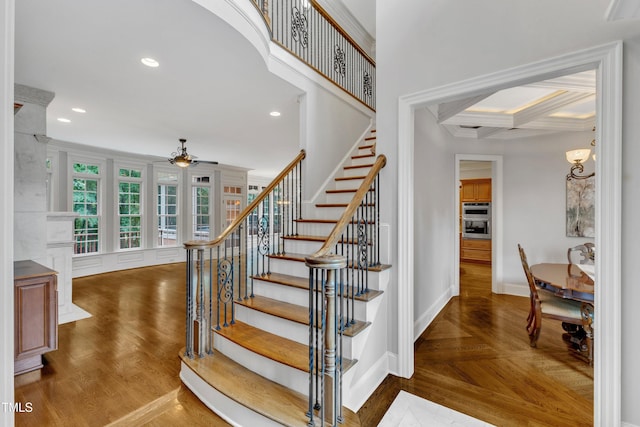 104 Bellagio Dr, Apex, NC 27539 - staircase with baseboards, ceiling fan, wood finished floors, recessed lighting, and beamed ceiling
