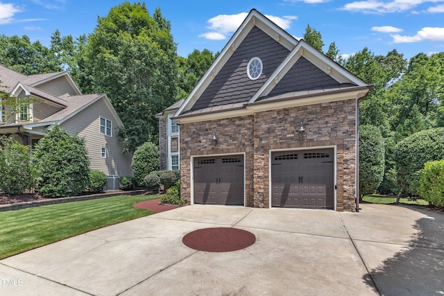 104 Bellagio Dr, Apex, NC 27539 - view of side of home with stone siding, driveway, a lawn, a standing seam roof, and a garage