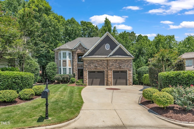 104 Bellagio Dr, Apex, NC 27539 - french country inspired facade featuring driveway, a front yard, stone siding, and a garage