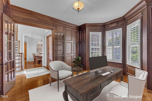 104 Bellagio Dr, Apex, NC 27539 - office with ornamental molding, wood finished floors, a chandelier, baseboards, and french doors