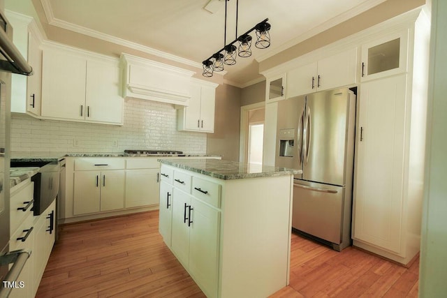100 Acc Dr W, Wilson, NC 27893 - kitchen with stainless steel fridge, ornamental molding, light wood-style floors, light stone counters, and tasteful backsplash