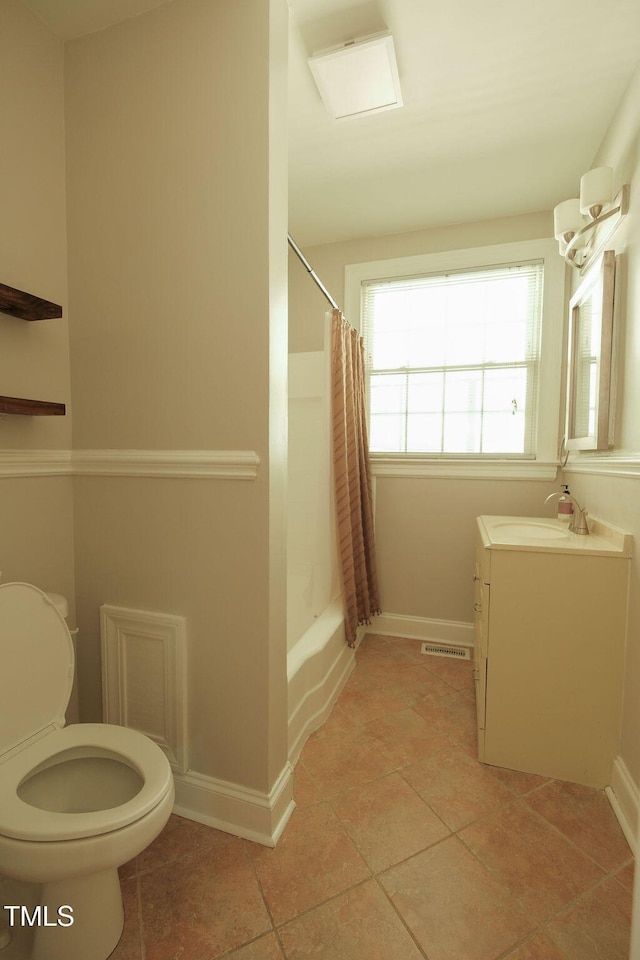 100 Acc Dr W, Wilson, NC 27893 - full bath with vanity, toilet, shower / bathtub combination with curtain, and baseboards