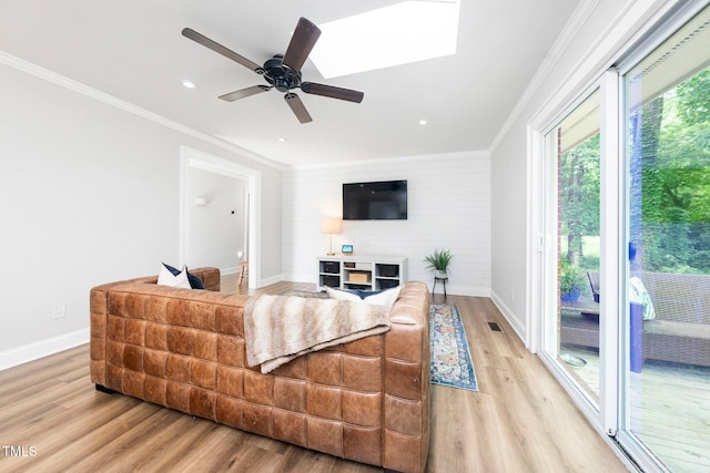 2968 Tram Rd, Fuquay Varina, NC 27526 - living room with light wood finished floors, baseboards, a ceiling fan, ornamental molding, and recessed lighting