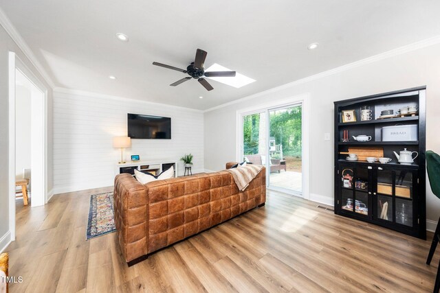 2968 Tram Rd, Fuquay Varina, NC 27526 - living area featuring ceiling fan, light wood-type flooring, ornamental molding, baseboards, and recessed lighting
