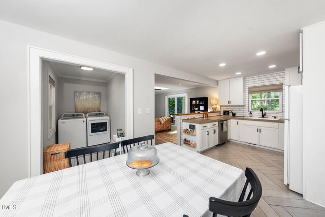 2968 Tram Rd, Fuquay Varina, NC 27526 - dining room featuring washer and dryer and recessed lighting
