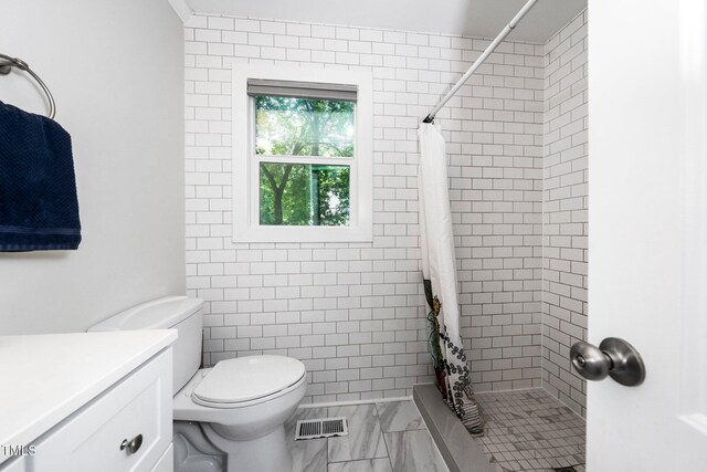 2968 Tram Rd, Fuquay Varina, NC 27526 - full bath featuring tiled shower, marble look tiles, toilet, and vanity