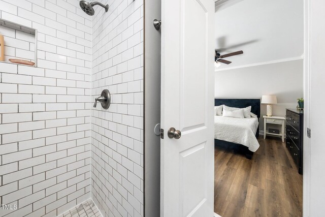 2968 Tram Rd, Fuquay Varina, NC 27526 - ensuite bathroom featuring a stall shower, ceiling fan, ornamental molding, and wood finished floors
