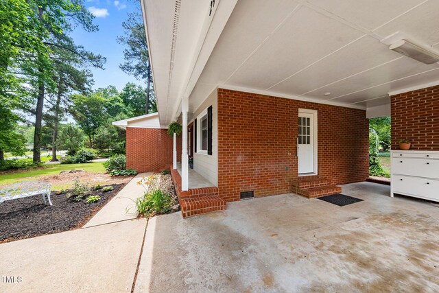 2968 Tram Rd, Fuquay Varina, NC 27526 - view of patio with entry steps and a carport