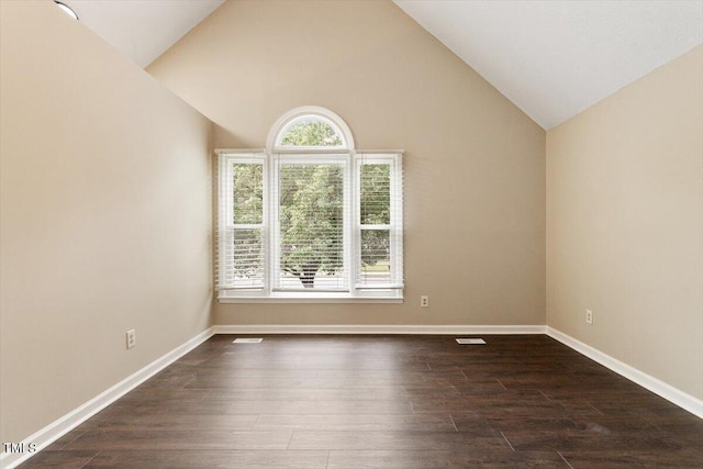71 E Boxley Dr, Wendell, NC 27591 - unfurnished room with dark wood-style floors, baseboards, and vaulted ceiling