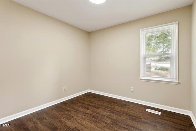 71 E Boxley Dr, Wendell, NC 27591 - empty room featuring baseboards and dark wood-style floors