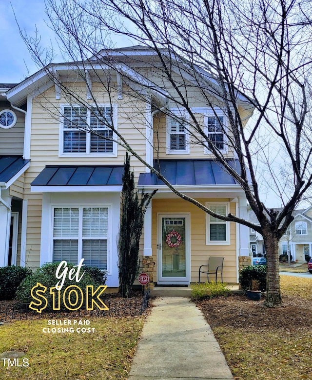 4202 Cherry Blossom Cir, Durham, NC 27713 - view of front of home featuring a standing seam roof and metal roof
