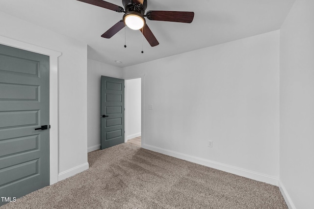 2513 Rochelle St, Durham, NC 27703 - unfurnished bedroom featuring carpet floors, baseboards, and ceiling fan