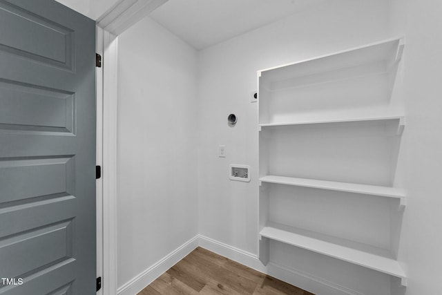 2513 Rochelle St, Durham, NC 27703 - laundry area with washer hookup, wood finished floors, and baseboards