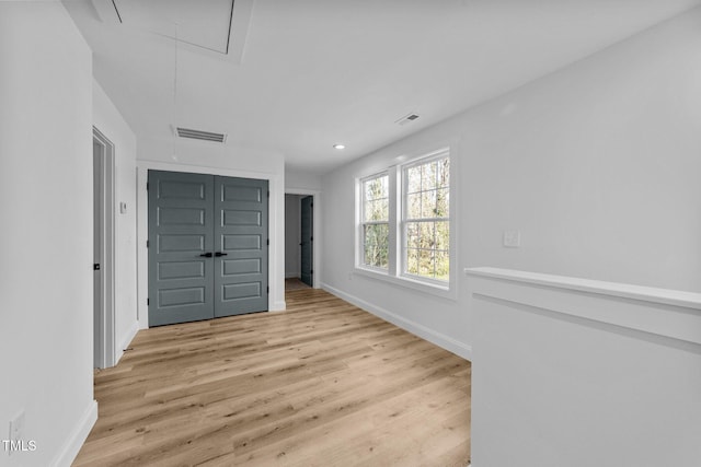 2513 Rochelle St, Durham, NC 27703 - entryway with wood finished floors, baseboards, and recessed lighting