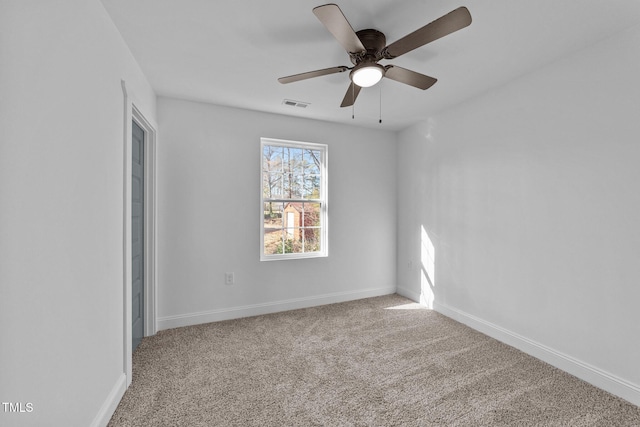 2513 Rochelle St, Durham, NC 27703 - carpeted empty room with baseboards and ceiling fan