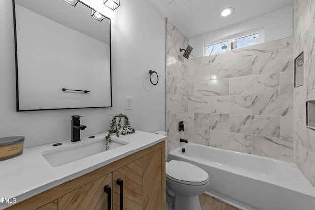 2513 Rochelle St, Durham, NC 27703 - full bath featuring vanity, toilet, shower / bath combination, and wood finished floors
