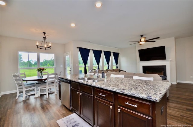 1865 John B Carter Rd, Fayetteville, NC 28312 - kitchen featuring stainless steel dishwasher, a sink, ceiling fan, baseboards, and recessed lighting