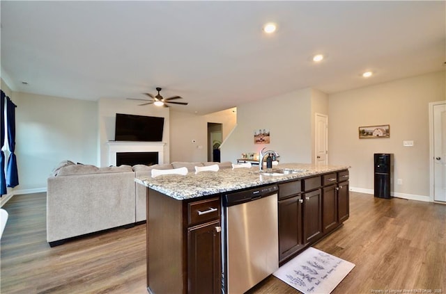 1865 John B Carter Rd, Fayetteville, NC 28312 - kitchen featuring dishwasher, a sink, ceiling fan, wood finished floors, and dark brown cabinets