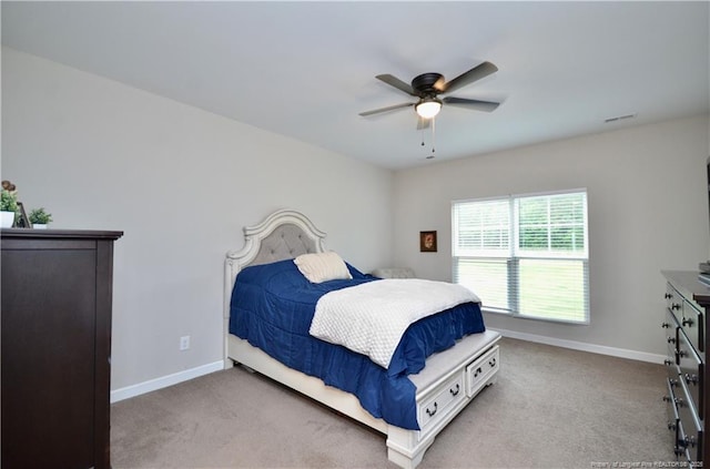 1865 John B Carter Rd, Fayetteville, NC 28312 - bedroom featuring baseboards, carpet flooring, and a ceiling fan