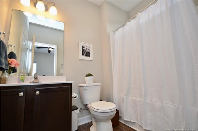 1865 John B Carter Rd, Fayetteville, NC 28312 - full bath featuring toilet, vanity, wood finished floors, and curtained shower