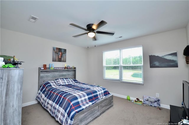 1865 John B Carter Rd, Fayetteville, NC 28312 - bedroom featuring carpet floors, baseboards, and a ceiling fan