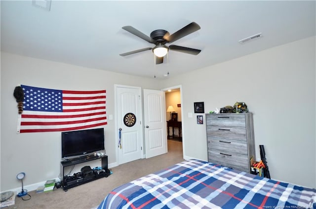 1865 John B Carter Rd, Fayetteville, NC 28312 - bedroom with carpet, baseboards, and a ceiling fan