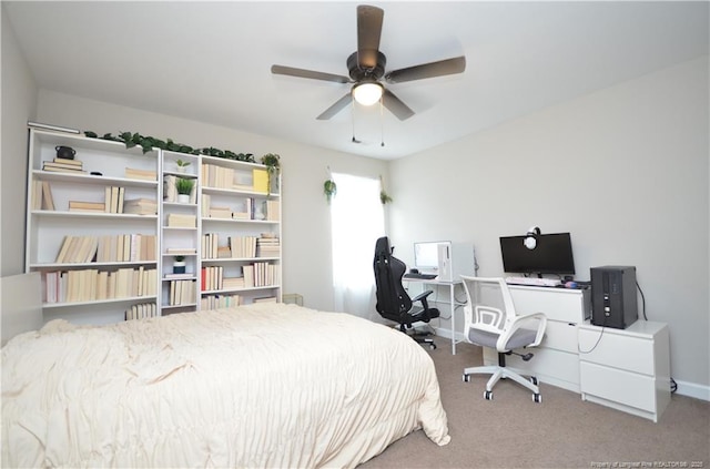 1865 John B Carter Rd, Fayetteville, NC 28312 - carpeted bedroom with a desk and baseboards