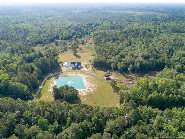 1865 John B Carter Rd, Fayetteville, NC 28312 - aerial view of property and surrounding area with a heavily wooded area and a pool area