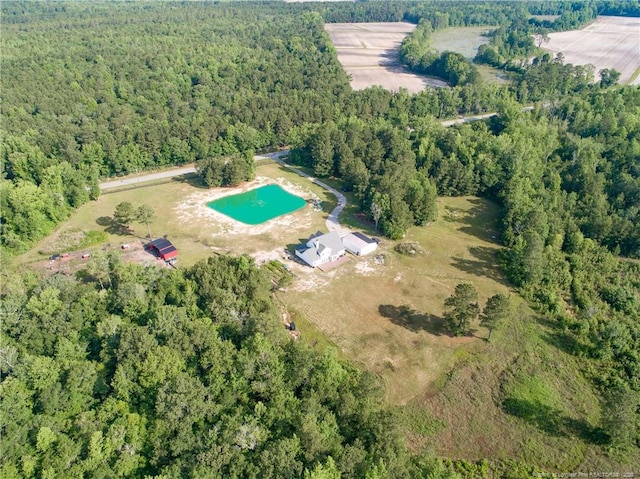1865 John B Carter Rd, Fayetteville, NC 28312 - aerial view of property and surrounding area with a heavily wooded area and a pool area